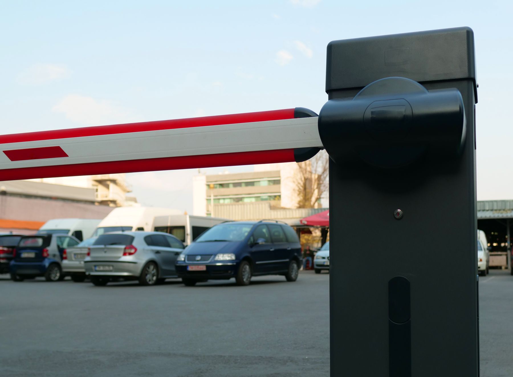 Automated barrier controlling entry to a parking area